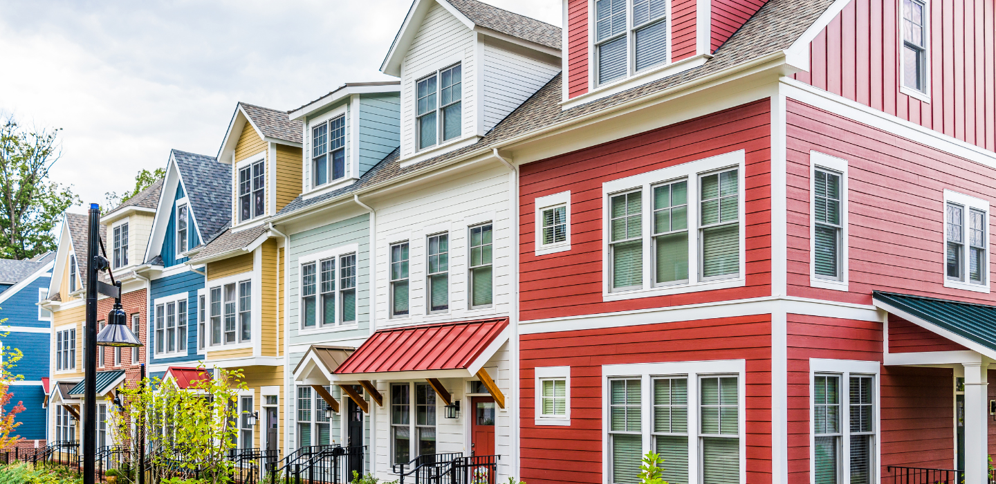 a brightly colored multi family facility of townhouses secured with investment lending solutions with oakmont commercial